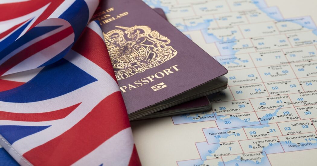united-kingdom-passport-with-union-jack-flag-map (1)-min